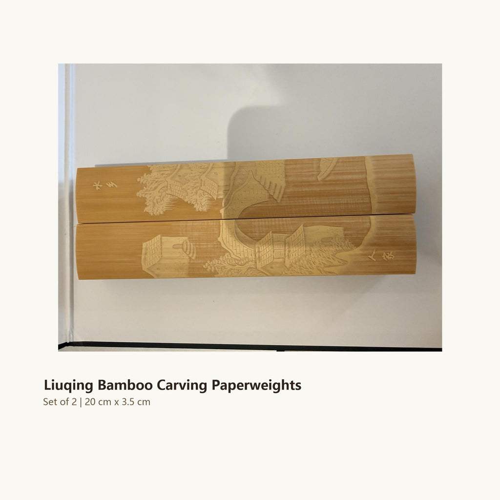 Front view of two hand-carved Liuqing bamboo paperweights — intangible cultural heritage craft, one-of-a-kind
