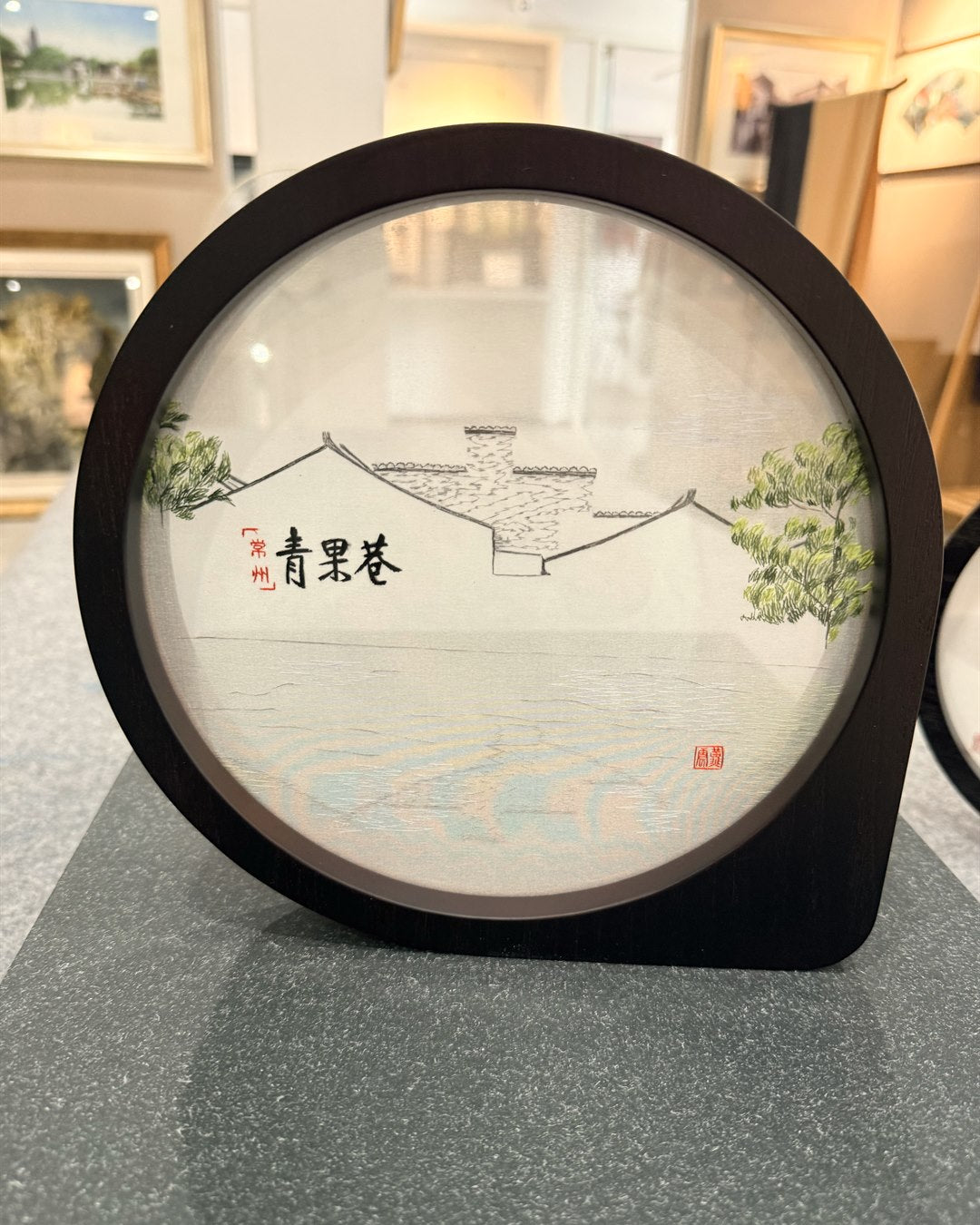 Custom landscape silk embroidery in tabletop wood frame display