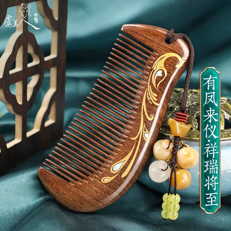 Black sandalwood comb with shimmering Fengming phoenix mother-of-pearl motif