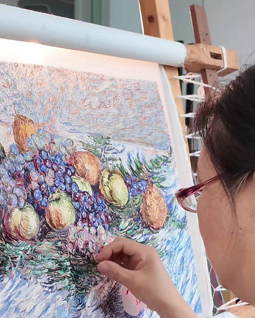Changzhou artisan working on handmade embroidery