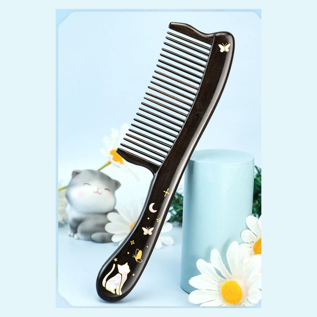 Black ebony wood cat comb styled with daisies and soft blue decor
