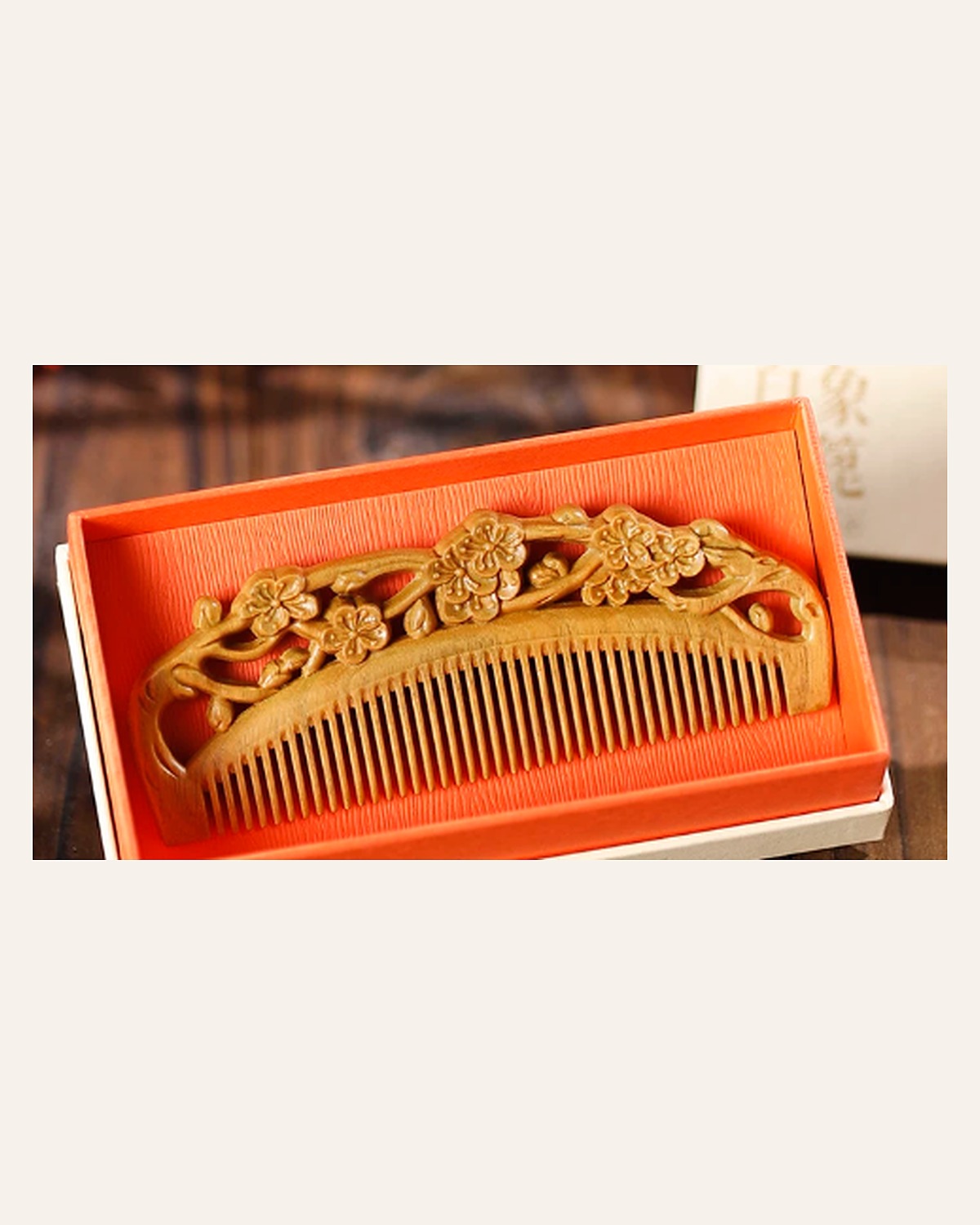 Hand-carved Chinese wooden comb in gift box packaging
