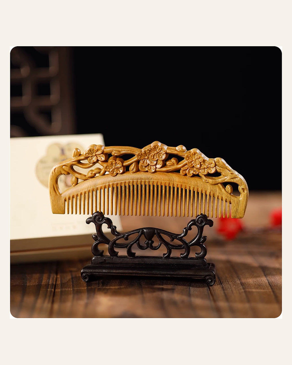 Hand-carved plum blossom wooden comb with double-sided floral carving
