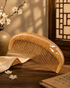 Hand-painted boxwood comb with crane motif, handcrafted by Chinese artisans using traditional heritage techniques.