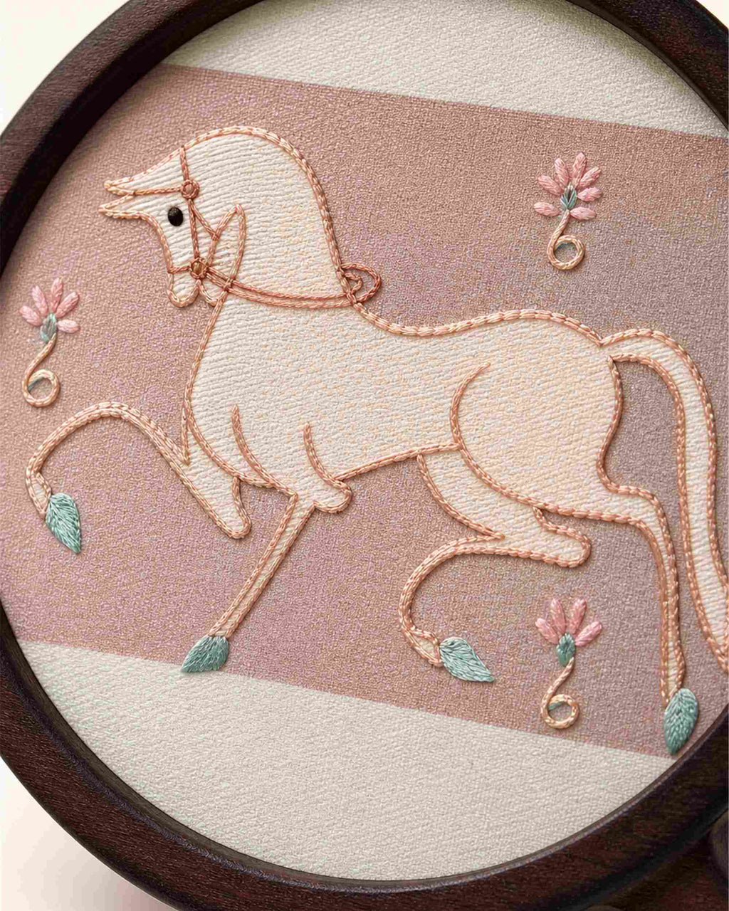 Close-up of handmade mulberry silk embroidery — Lucky Horse motif in Changzhou Random-Stitch technique
