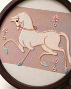 Close-up of handmade mulberry silk embroidery — Lucky Horse motif in Changzhou Random-Stitch technique